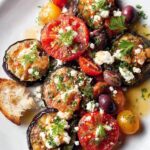 Blistered Eggplant With Tomatoes, Olives, and Feta Recipe