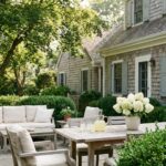 Martha Stewart outdoor aesthetic patio with teak furniture and white hydrangeas